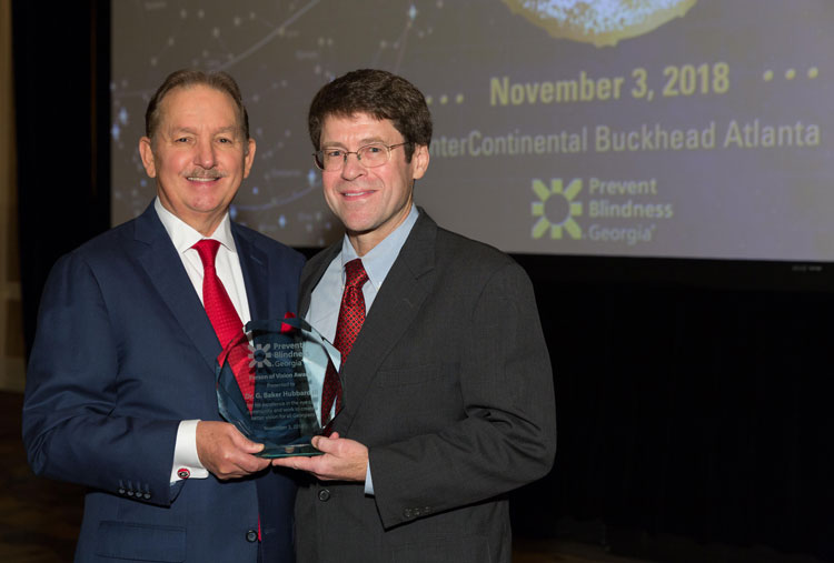 Gainesville Eye Associates' Dr. Jack Chapman (left) had the honor of presenting the award to the Prevent Blindness Honoree, G. Baker Hubbard III, M.D.